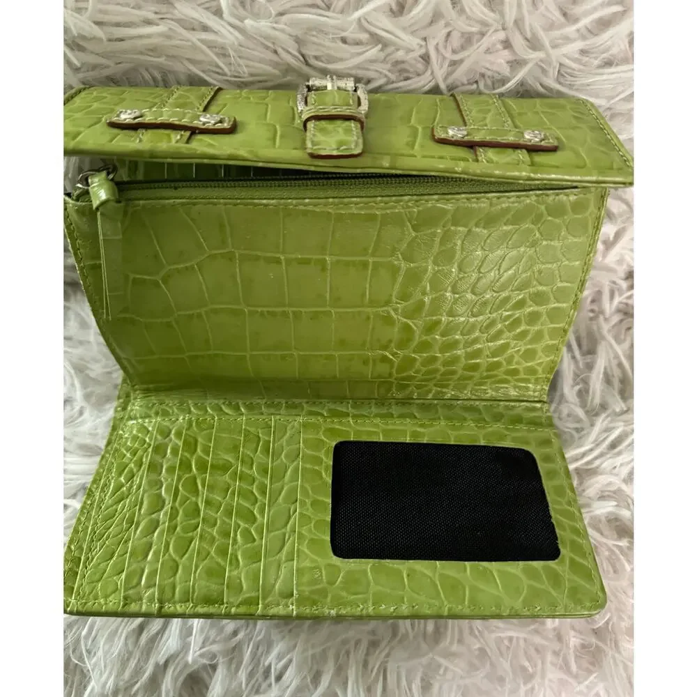 Michael Kors “Natasha” croc embossed leather wallet.